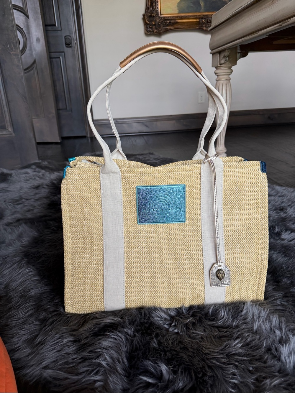 Calling all Beaches! Kurt Geiger Cream Straw Tote with Blue Metallic Logo Patch - Picture 9 of 9